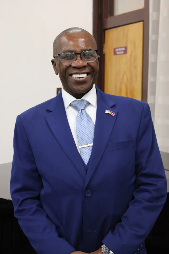 Happy gentleman wearing glasses and tie