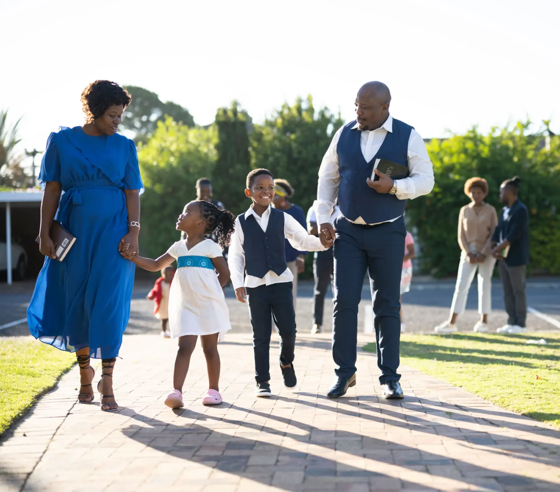 Parents and children strolling outside